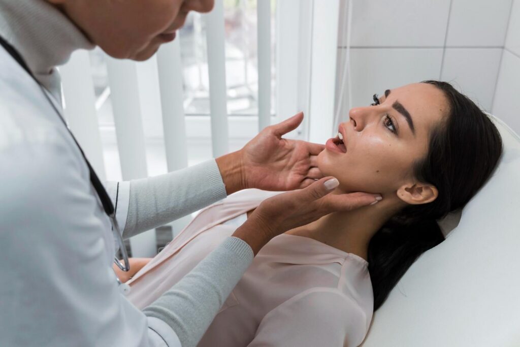 dentist examining patient from Sunland Park